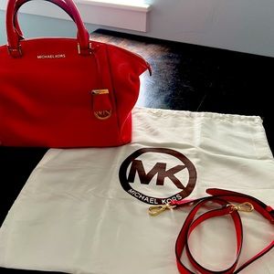 Coral red Michael Kors purse with dust bag